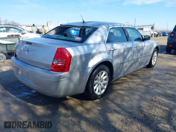 2008 Chrysler 300 LX with VIN 2C3KA43R48H251025, listed as a IAAI auction lot 41510553 with 104,103 mi miles. Bid and sale history available at carsss.com. Image 4.