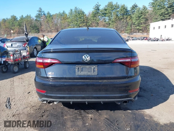 2019 Volkswagen Jetta GLI S z VIN 3VW5T7BU1KM156888, wystawiony jako IAAI lot #40778065 z przebiegiem 97 114 mil mil oraz . Historia ofert i sprzedaży dostępna na DreamBid. Obrazek 16.