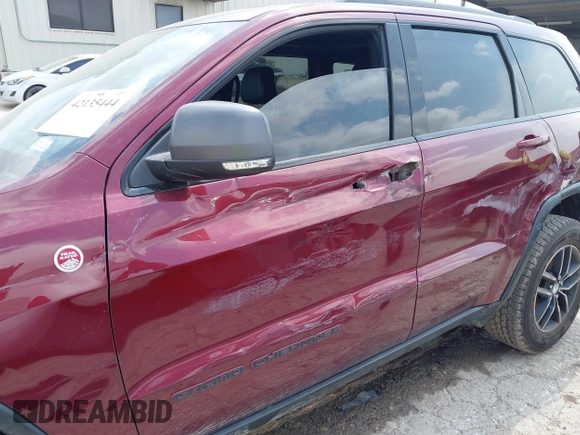 2017 Jeep Grand Cherokee Trailhawk with VIN 1C4RJFLG3HC699828, listed as a IAAI auction lot 42135444 with 98,596 mi miles and . Bid and sale history available at DreamBid. Image 6.
