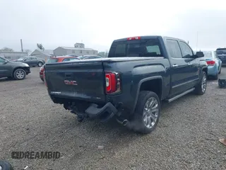 2017 GMC Sierra 1500 Denali with VIN 3GTU2PEJ5HG313350, listed as a IAAI auction lot 41968608 with 73,963 mi miles and . Bid and sale history available at DreamBid. Image 4.