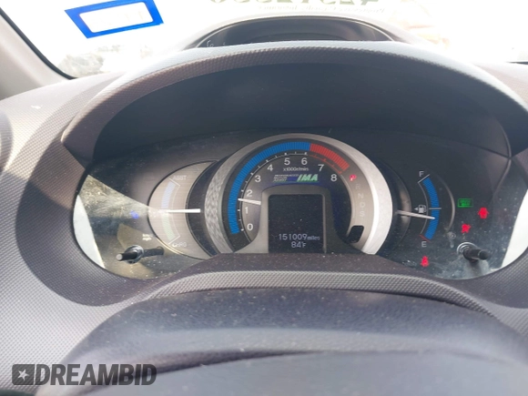 2010 Honda Insight EX with VIN JHMZE2H71AS043465, listed as a IAAI auction lot 42312556 with 151,009 mi miles and . Bid and sale history available at DreamBid. Image 7.