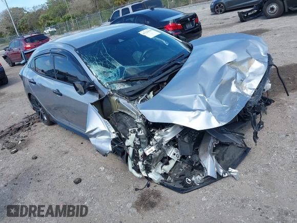 2021 Honda Civic Sport with VIN SHHFK7H43MU225961, listed as a IAAI auction lot 41721936 with 58,928 mi miles and . Bid and sale history available at DreamBid. Image 1.