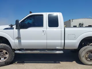 2011 Ford Super Duty F-250 SRW XL with VIN 1FT7X2BT8BEA50325, listed as a IAAI auction lot 41967600 with 189,932 mi miles. Bid and sale history available at carsss.com. Image 14.