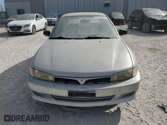 2001 Mitsubishi Mirage ES z VIN JA3AY26CX1U030593, wystawiony jako Copart lot #83749264 z przebiegiem 107 641 mil mil oraz Szkoda całkowita • Salvage title. Historia ofert i sprzedaży dostępna na DreamBid. Obrazek 5.