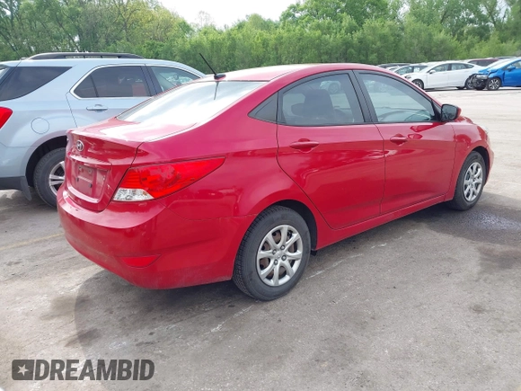 2014 Hyundai Accent GLS with VIN KMHCT4AEXEU600395, listed as a IAAI auction lot 42141052 with 172,284 mi miles. Bid and sale history available at carsss.com. Image 4.
