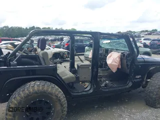 2008 Jeep Wrangler Unlimited Sahara with VIN 1J4GA59138L501621, listed as a IAAI auction lot 42245134 with 241,361 mi miles and . Bid and sale history available at DreamBid. Image 13.