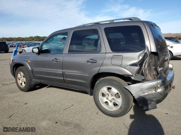 2003 Mazda Tribute LX with VIN 4F2YZ94183KM55266, listed as a Copart auction lot 80276174 with 154,358 mi miles and Salvage Title. Bid and sale history available at carsss.com. Image 2.
