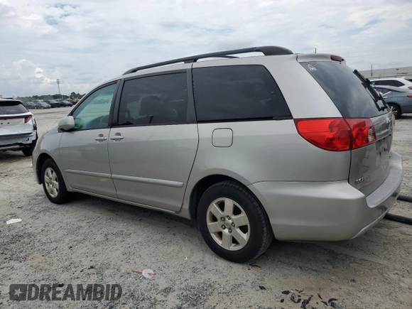 2012 Toyota Sienna XLE AAS with VIN 5TDYK3DC6CS275537, listed as a Copart auction lot 66040605 with 135,148 mi miles and Clean title. Bid and sale history available at DreamBid. Image 2.