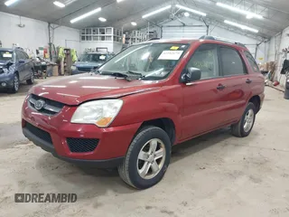2009 Kia Sportage LX with VIN KNDJE723497555026, listed as a IAAI auction lot 42102679 with 136,398 mi miles. Bid and sale history available at carsss.com. Image 2.