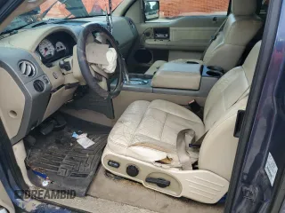 2004 Ford F-150 XLT with VIN 1FTPX14574NB65025, listed as a Copart auction lot 64567655 with 293,376 mi miles and Salvage title. Bid and sale history available at DreamBid. Image 7.