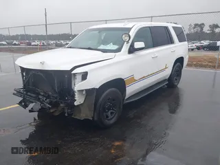 2019 Chevrolet Tahoe Commercial with VIN 1GNLCDEC4KR198330, listed as a IAAI auction lot 41542971 with 94,171 mi miles and . Bid and sale history available at DreamBid. Image 2.
