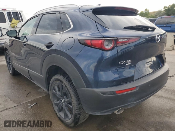 2023 Mazda CX-30 Premium Plus with VIN 3MVDMBEY9PM500907, listed as a Copart auction lot 70871494 with 38,599 mi miles and Salvage title. Bid and sale history available at DreamBid. Image 2.