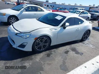 2015 Scion FR-S with VIN JF1ZNAA12F9709707, listed as a IAAI auction lot 41545940 with 107,575 mi miles. Bid and sale history available at carsss.com. Image 19.