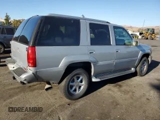 2000 GMC Denali z VIN 1GKEK63R8YR212220, wystawiony jako Copart lot #77606364 z przebiegiem 337 467 mil mil oraz Tytuł czysty. Historia ofert i sprzedaży dostępna na DreamBid. Obrazek 3.