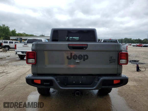2021 Jeep Gladiator Sport S с VIN 1C6HJTAG1ML599287, выставлен на аукционе Copart как лот 71597864 с пробегом 23 186 миль миль и Списание • Salvage title. История ставок и продаж доступна на DreamBid. Изображение 6.