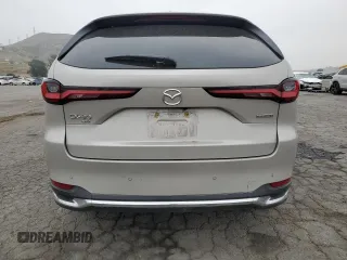 2024 Mazda CX-90 Premium Plus z VIN JM3KKEHD6R1187248, wystawiony jako Copart lot #55606165 z przebiegiem Nie podano mil oraz Szkoda całkowita • Salvage title. Historia ofert i sprzedaży dostępna na DreamBid. Obrazek 6.