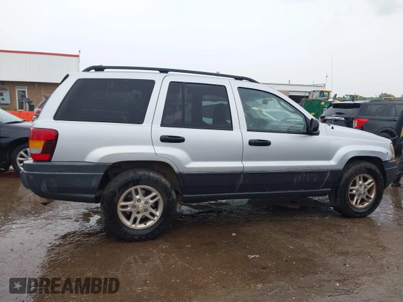 2004 Jeep Grand Cherokee Laredo z VIN 1J4GW48S64C132172, wystawiony jako IAAI lot #42163524 z przebiegiem 170 952 mil mil oraz . Historia ofert i sprzedaży dostępna na DreamBid. Obrazek 13.