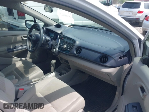 2010 Honda Insight EX z VIN JHMZE2H7XAS009007, wystawiony jako IAAI lot #42480220 z przebiegiem 158 379 mil mil oraz . Historia ofert i sprzedaży dostępna na DreamBid. Obrazek 5.