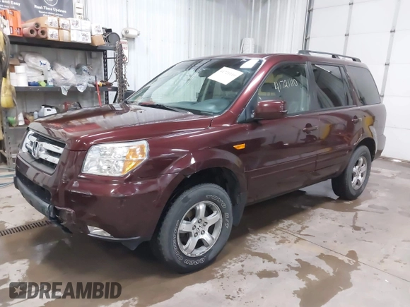 2007 Honda Pilot EX-L with VIN 5FNYF18537B017779, listed as a IAAI auction lot 41721110 with 98,724 mi miles. Bid and sale history available at carsss.com. Image 17.
