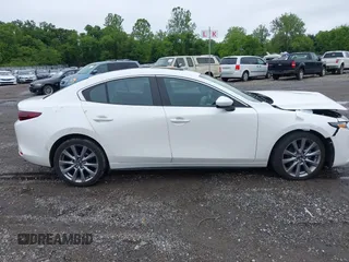 2021 Mazda 3 Preferred z VIN 3MZBPBCL0MM250862, wystawiony jako IAAI lot #42318612 z przebiegiem 86 056 mil mil oraz . Historia ofert i sprzedaży dostępna na DreamBid. Obrazek 13.