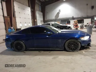 2015 Ford Mustang GT with VIN 1FA6P8CF1F5379452, listed as a IAAI auction lot 41355235 with 128,257 mi miles and . Bid and sale history available at DreamBid. Image 13.