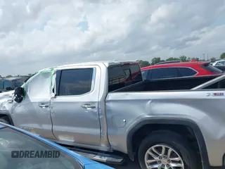 2020 GMC Sierra 1500 SLT z VIN 3GTU9DED9LG299417, wystawiony jako IAAI lot #42168562 z przebiegiem Nie podano mil oraz . Historia ofert i sprzedaży dostępna na DreamBid. Obrazek 14.