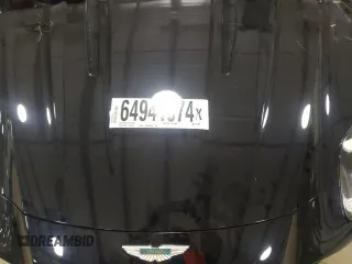 2024 Aston Martin DB12 z VIN SCFRMFGW5RGM12901, wystawiony jako Copart lot #64941574 z przebiegiem Nie podano mil oraz Nie do naprawy. Historia ofert i sprzedaży dostępna na DreamBid. Obrazek 11.