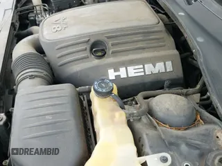 2013 Chrysler 300 S с VIN 2C3CCABT2DH735764, выставлен на аукционе IAAI как лот 41977616 с пробегом 164 517 миль миль и . История ставок и продаж доступна на DreamBid. Изображение 19.