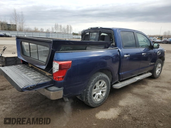 2017 Nissan Titan SV with VIN 1N6AA1EJXHN534790, listed as a Copart auction lot 52567735 with 184,884 mi miles and Salvage Title. Bid and sale history available at DreamBid. Image 3.