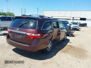 2011 Honda Odyssey EX with VIN 5FNRL5H42BB021438, listed as a IAAI auction lot 41978690 with 190,495 mi miles and . Bid and sale history available at carsss.com. Image 4.