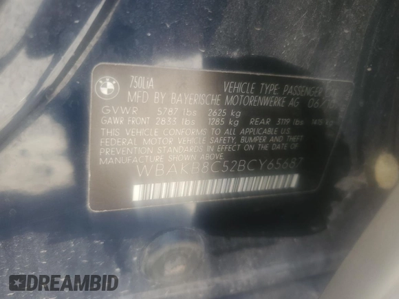 2011 BMW 7 Series 750Li z VIN WBAKB8C52BCY65687, wystawiony jako Copart lot #52441335 z przebiegiem Nie podano mil oraz Nie do naprawy • Non repairable. Historia ofert i sprzedaży dostępna na DreamBid. Obrazek 13.