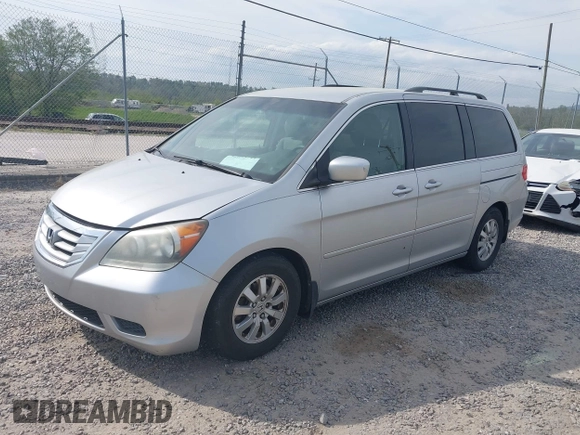 2010 Honda Odyssey EX with VIN 5FNRL3H43AB025629, listed as a IAAI auction lot 42095744 with 209,722 mi miles and . Bid and sale history available at DreamBid. Image 2.