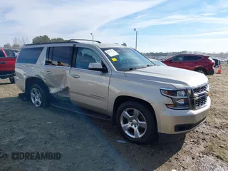 2016 Chevrolet Suburban LT z VIN 1GNSCHKC3GR179301, wystawiony jako IAAI lot #38251514 z przebiegiem 164 761 mil mil oraz . Historia ofert i sprzedaży dostępna na DreamBid. Obrazek 1.