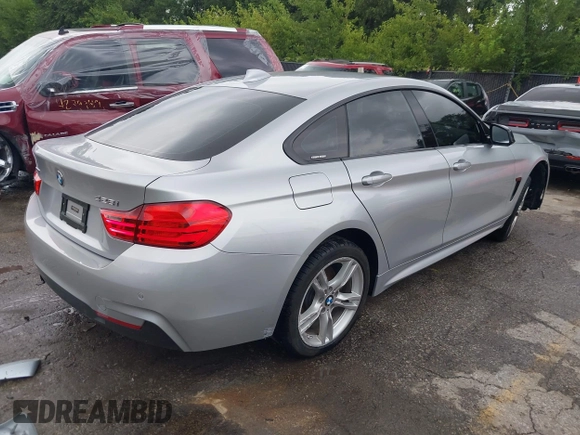 2016 BMW 4 Series 428i xDrive z VIN WBA4C9C57GG137858, wystawiony jako IAAI lot #42755021 z przebiegiem 92 728 mil mil oraz . Historia ofert i sprzedaży dostępna na DreamBid. Obrazek 4.