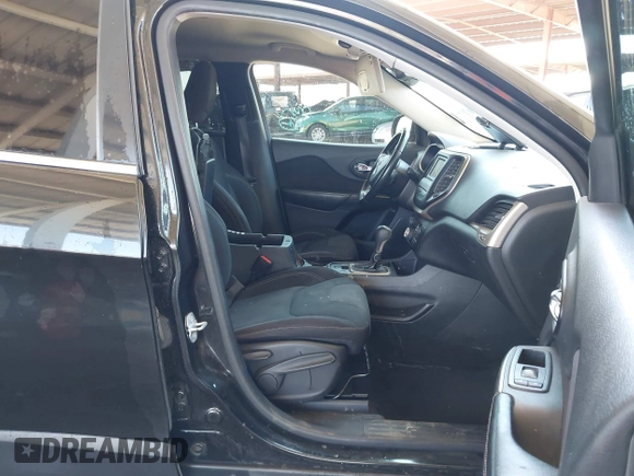 2015 Jeep Cherokee Latitude with VIN 1C4PJLCB8FW669150, listed as a IAAI auction lot 42122669 with 194,525 mi miles and . Bid and sale history available at DreamBid. Image 5.