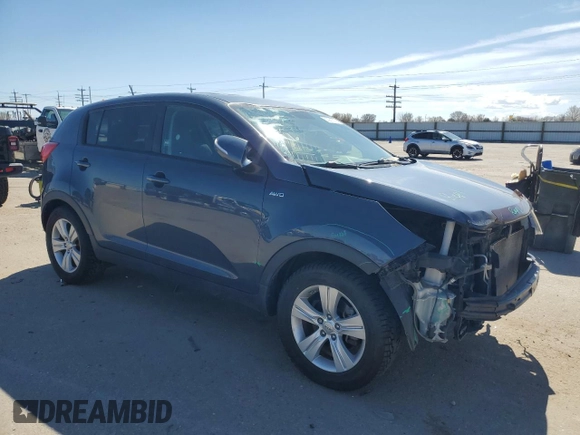 2013 Kia Sportage LX z VIN KNDPBCA29D7459647, wystawiony jako Copart lot #50081725 z przebiegiem 125 855 mil mil oraz Szkoda całkowita • Salvage title. Historia ofert i sprzedaży dostępna na DreamBid. Obrazek 4.