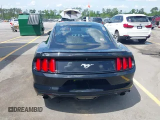 2016 Ford Mustang EcoBoost z VIN 1FA6P8TH2G5276754, wystawiony jako IAAI lot #42157727 z przebiegiem 71 174 mil mil oraz . Historia ofert i sprzedaży dostępna na DreamBid. Obrazek 16.