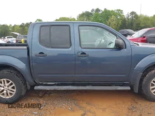 2014 Nissan Frontier SV z VIN 1N6AD0EV0EN762443, wystawiony jako IAAI lot #41956126 z przebiegiem 59 656 mil mil oraz . Historia ofert i sprzedaży dostępna na DreamBid. Obrazek 13.