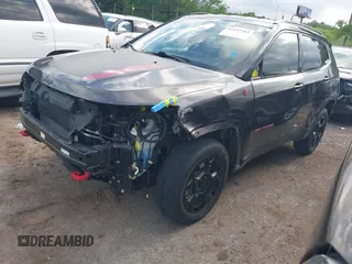 2023 Jeep Compass Trailhawk with VIN 3C4NJDDNXPT536872, listed as a IAAI auction lot 42437282 with 28,293 mi miles and . Bid and sale history available at DreamBid. Image 2.