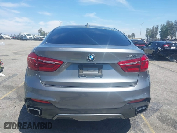 2018 BMW X6 xDrive35i z VIN 5UXKU2C51J0X50913, wystawiony jako IAAI lot #42078443 z przebiegiem Nie podano mil oraz . Historia ofert i sprzedaży dostępna na DreamBid. Obrazek 15.
