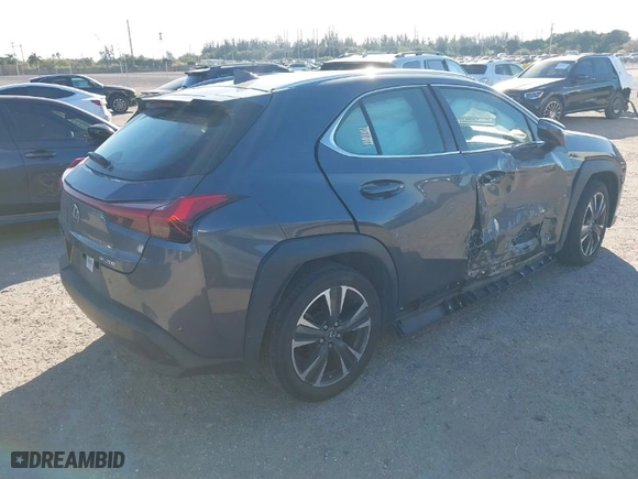 2022 Lexus UX with VIN JTHX3JBH0N2049479, listed as a IAAI auction lot 41048323 with 25,841 mi miles. Bid and sale history available at carsss.com. Image 4.