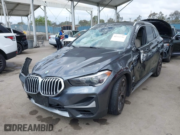 2021 BMW X1 xDrive28i with VIN WBXJG9C03M3M80011, listed as a IAAI auction lot 42137781 with 132,969 mi miles. Bid and sale history available at carsss.com. Image 17.