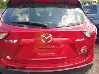 2015 Mazda CX-5 Sport with VIN JM3KE2BE8F0451014, listed as a IAAI auction lot 42536333 with 131,059 mi miles and . Bid and sale history available at DreamBid. Image 16.