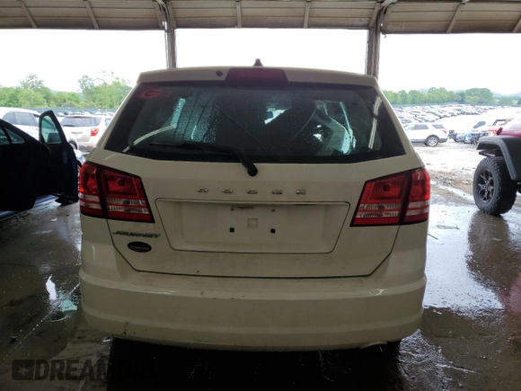 2015 Dodge Journey SE z VIN 3C4PDCAB0FT720639, wystawiony jako Copart lot #55200395 z przebiegiem 105 640 mil mil oraz Szkoda całkowita • Salvage title. Historia ofert i sprzedaży dostępna na DreamBid. Obrazek 6.