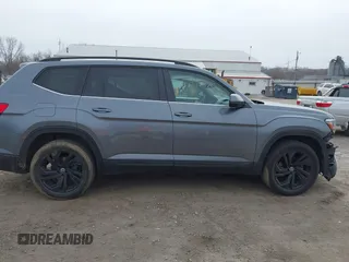 2021 Volkswagen Atlas SE z VIN 1V2KR2CA0MC570498, wystawiony jako IAAI lot #41807676 z przebiegiem 56 434 mil mil oraz . Historia ofert i sprzedaży dostępna na DreamBid. Obrazek 14.