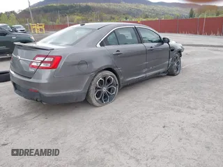 2014 Ford Taurus SHO with VIN 1FAHP2KTXEG160800, listed as a IAAI auction lot 42083237 with 75,048 mi miles. Bid and sale history available at carsss.com. Image 4.