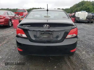2015 Hyundai Accent GLS with VIN KMHCT4AE8FU927153, listed as a Copart auction lot 61056473 with 117,105 mi miles. Bid and sale history available at carsss.com. Image 6.