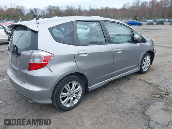 2009 Honda Fit Sport with VIN JHMGE88429S059170, listed as a IAAI auction lot 42091260 with 135,822 mi miles. Bid and sale history available at carsss.com. Image 4.