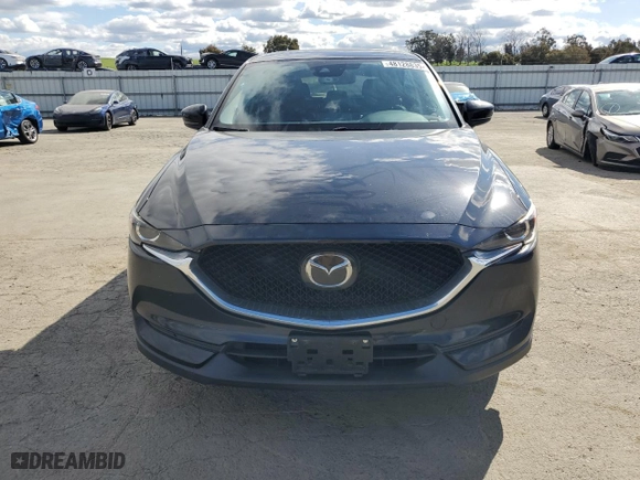 2020 Mazda CX-5 Touring with VIN JM3KFACM6L1800318, listed as a Copart auction lot 48128835 with 51,981 mi miles and Salvage Title. Bid and sale history available at carsss.com. Image 5.