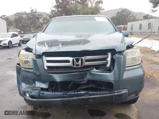 2006 Honda Pilot EX-L with VIN 2HKYF18506H503658, listed as a IAAI auction lot 41744963 with 215,575 mi miles. Bid and sale history available at carsss.com. Image 12.